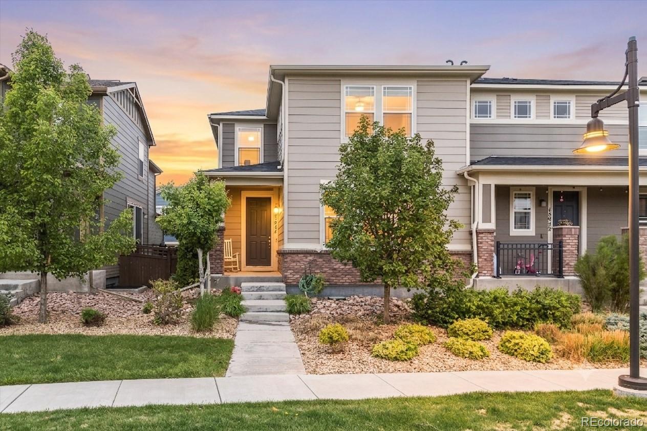Front of 15924 E Otero Circle at dusk